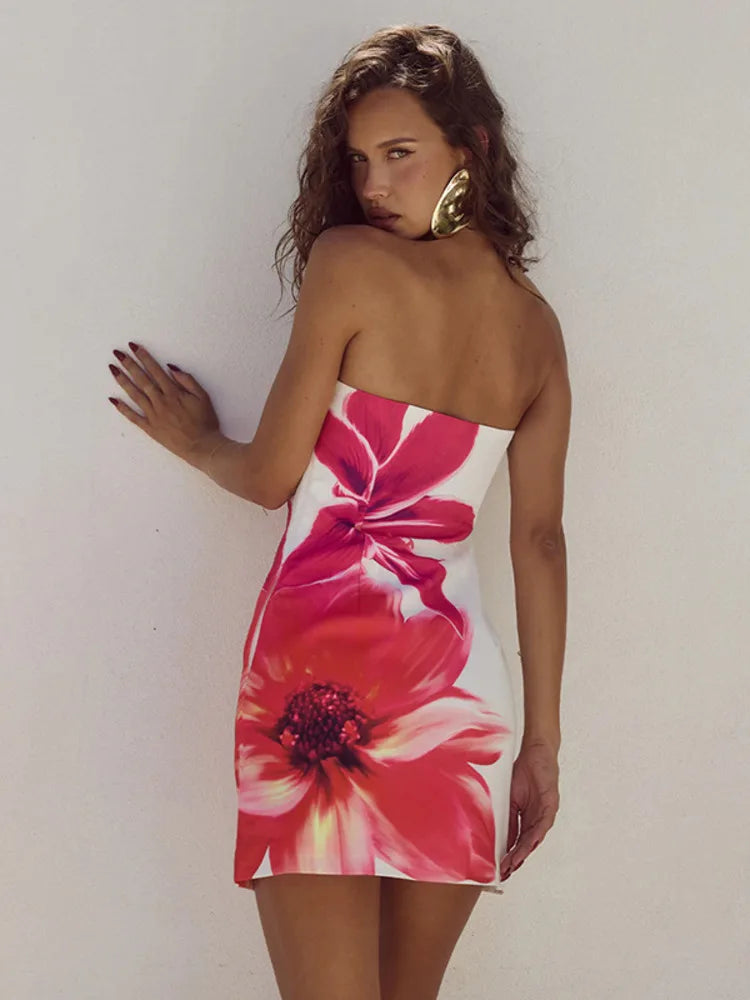 Women's summer mini dress with vibrant floral pattern and adjustable spaghetti straps